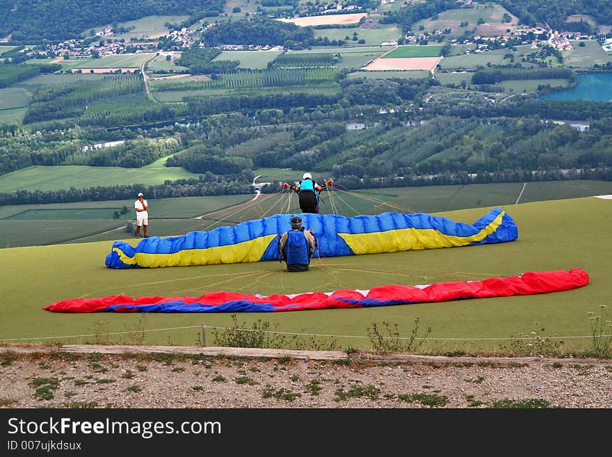 Paraglider taking off from a cliff. Paraglider taking off from a cliff