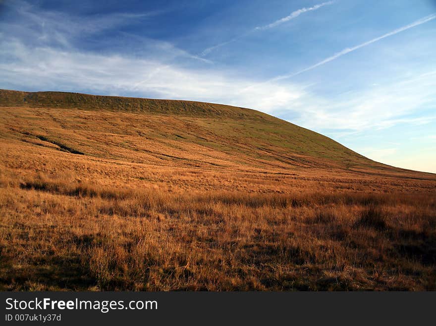 An eroded barren mountain in the brecon beacons national park south wales UK. An eroded barren mountain in the brecon beacons national park south wales UK