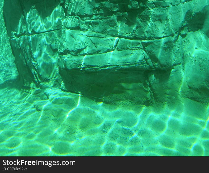 View of rocks from under the water. View of rocks from under the water