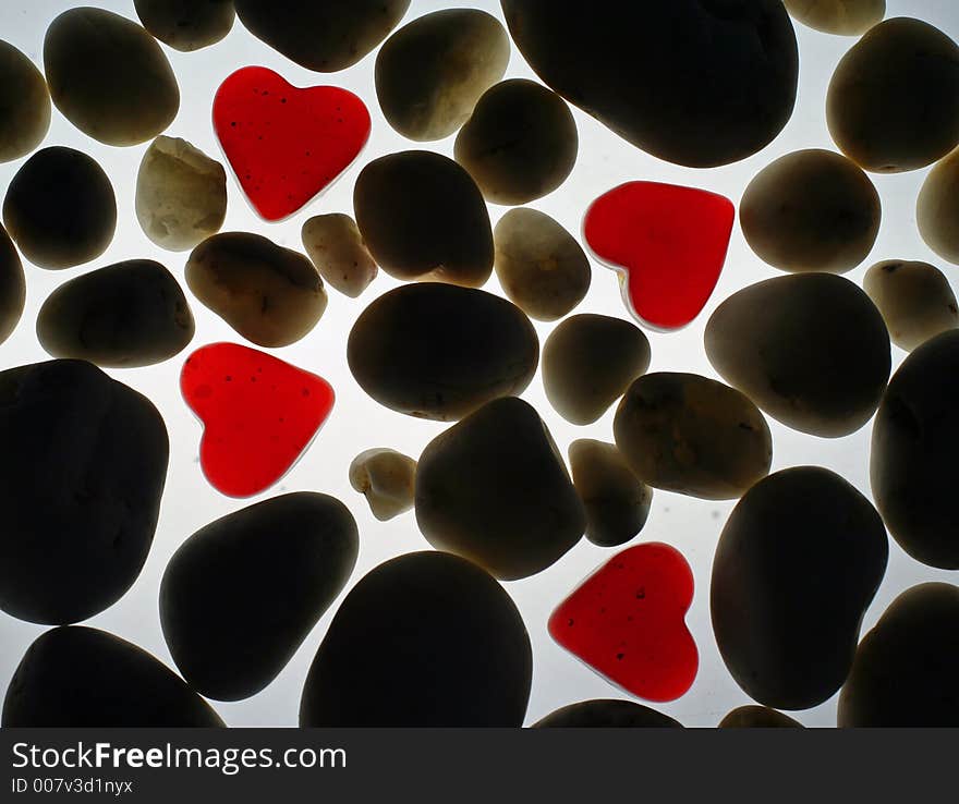 Red hearts with sea stones. Red hearts with sea stones