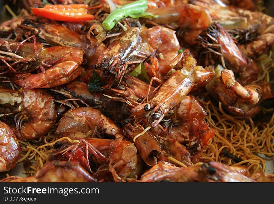 Large tiger prawns cooked in a dry assam jawa style