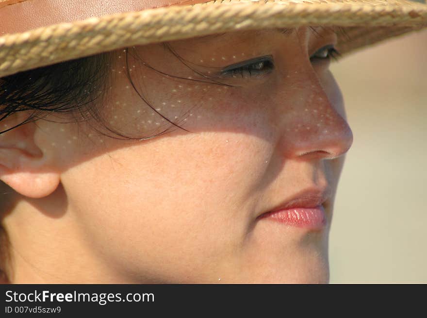 A lady in hat , closeup. A lady in hat , closeup