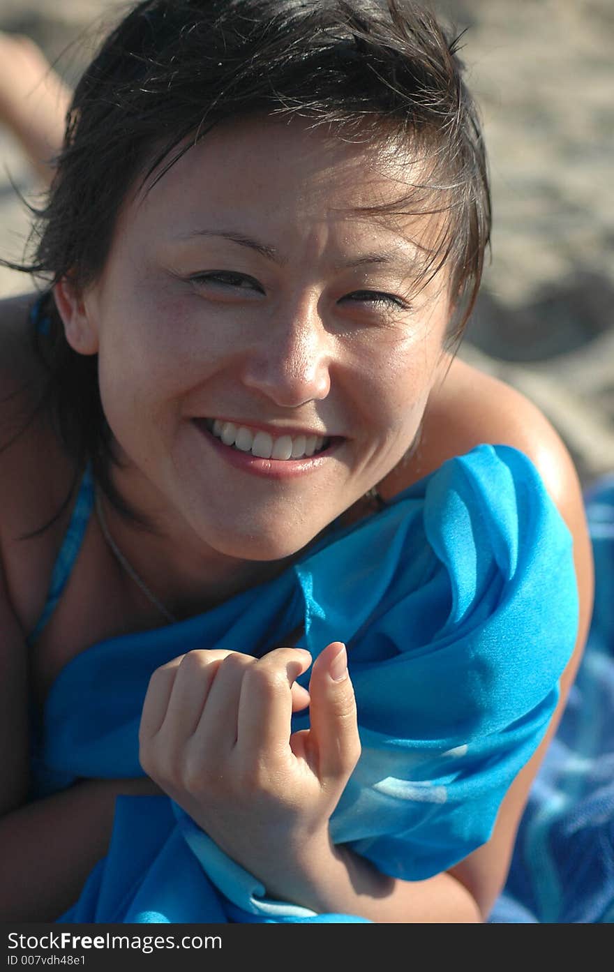 A happy asiam woman on the beach. A happy asiam woman on the beach