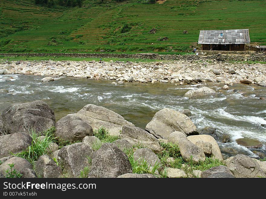 A shed on a hill with a river in front in Sapa, Vietnam. A shed on a hill with a river in front in Sapa, Vietnam