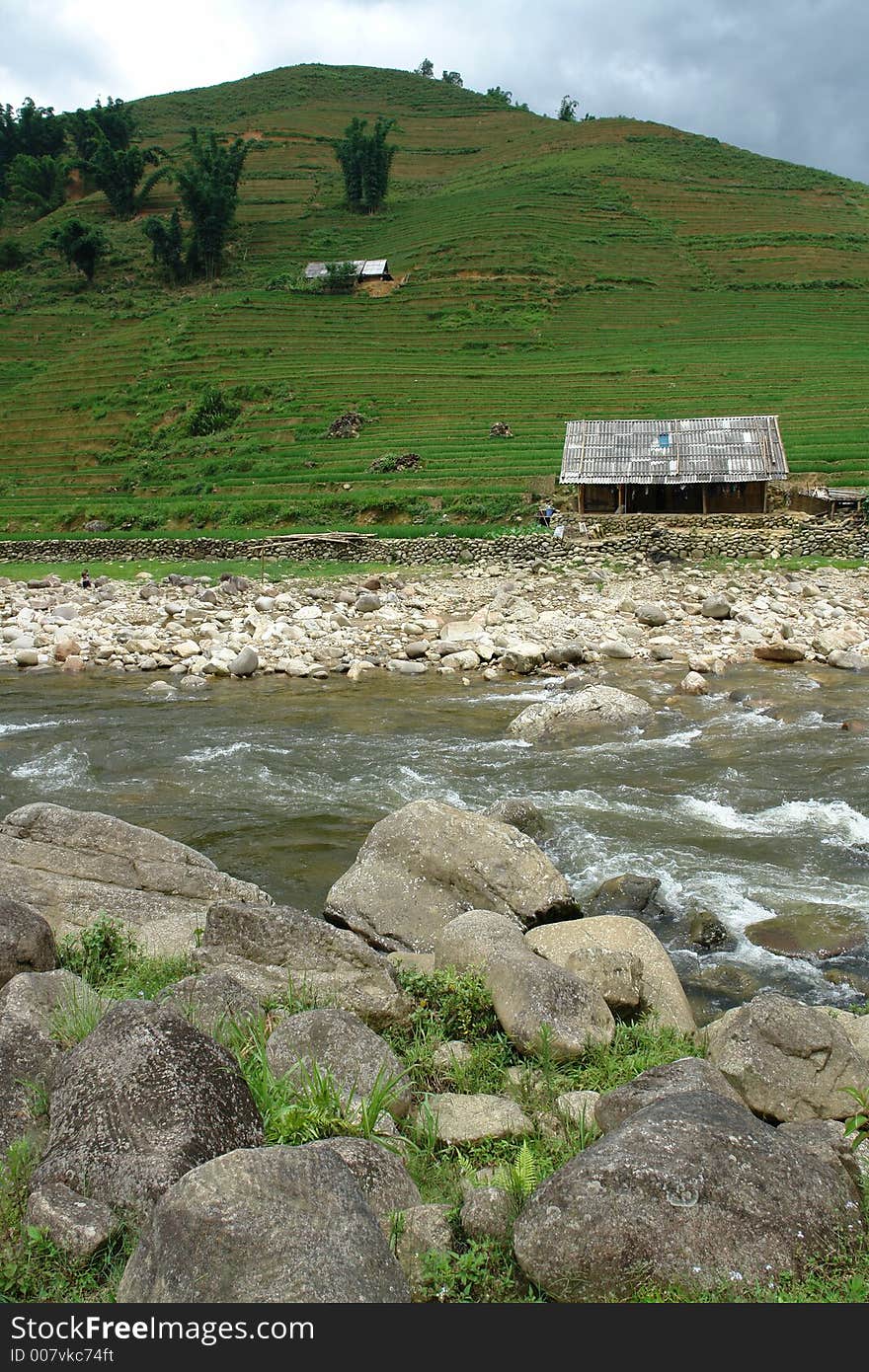 A shed on a hill with a river in front in Sapa, Vietnam. A shed on a hill with a river in front in Sapa, Vietnam