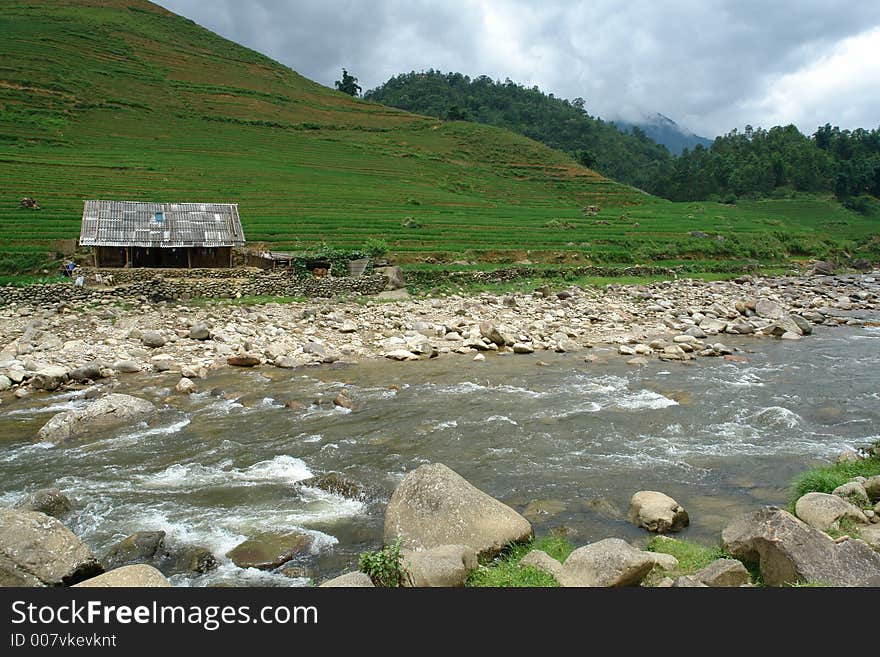 A shed on a hill with a river in front in Sapa, Vietnam. A shed on a hill with a river in front in Sapa, Vietnam