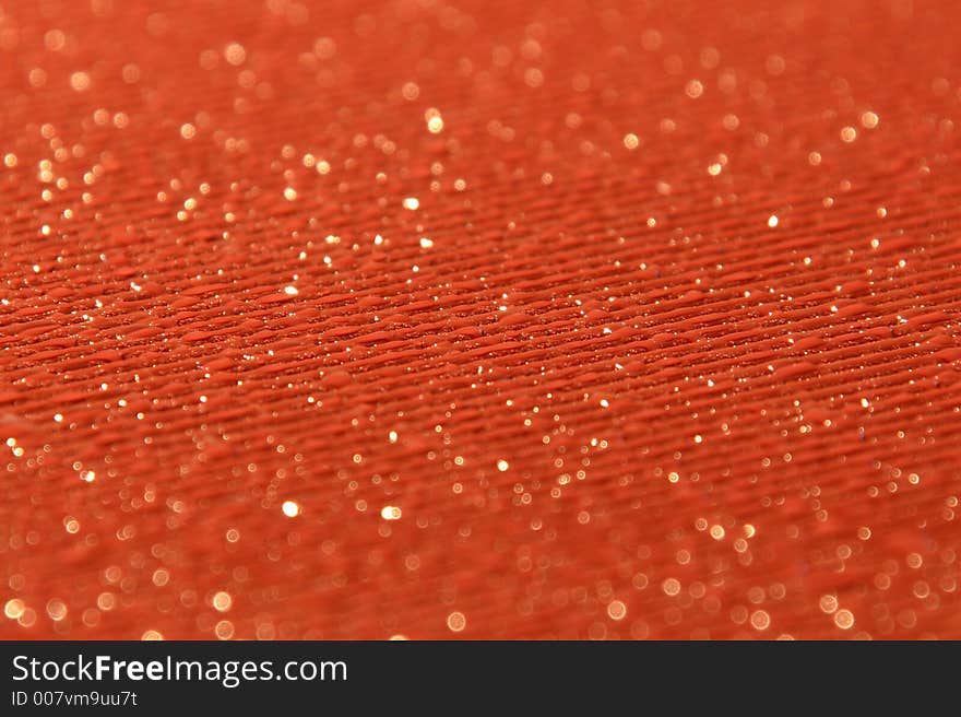 Water drops on a striped and textured orange bakground. Water drops on a striped and textured orange bakground