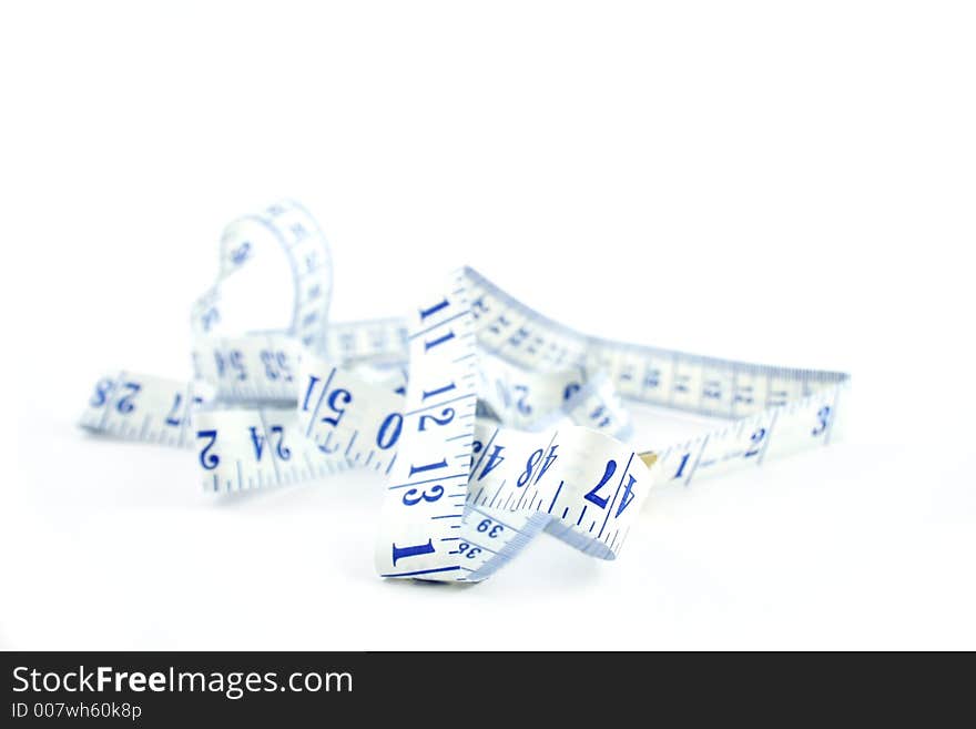 Tape measure on a white background