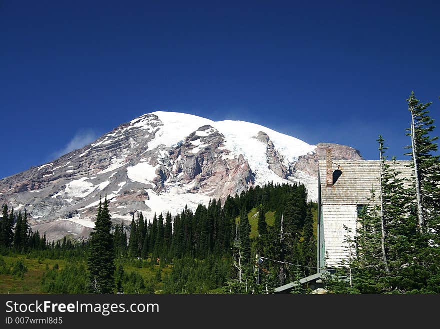 Snow covered summit of Mt. Rainie and Cabin