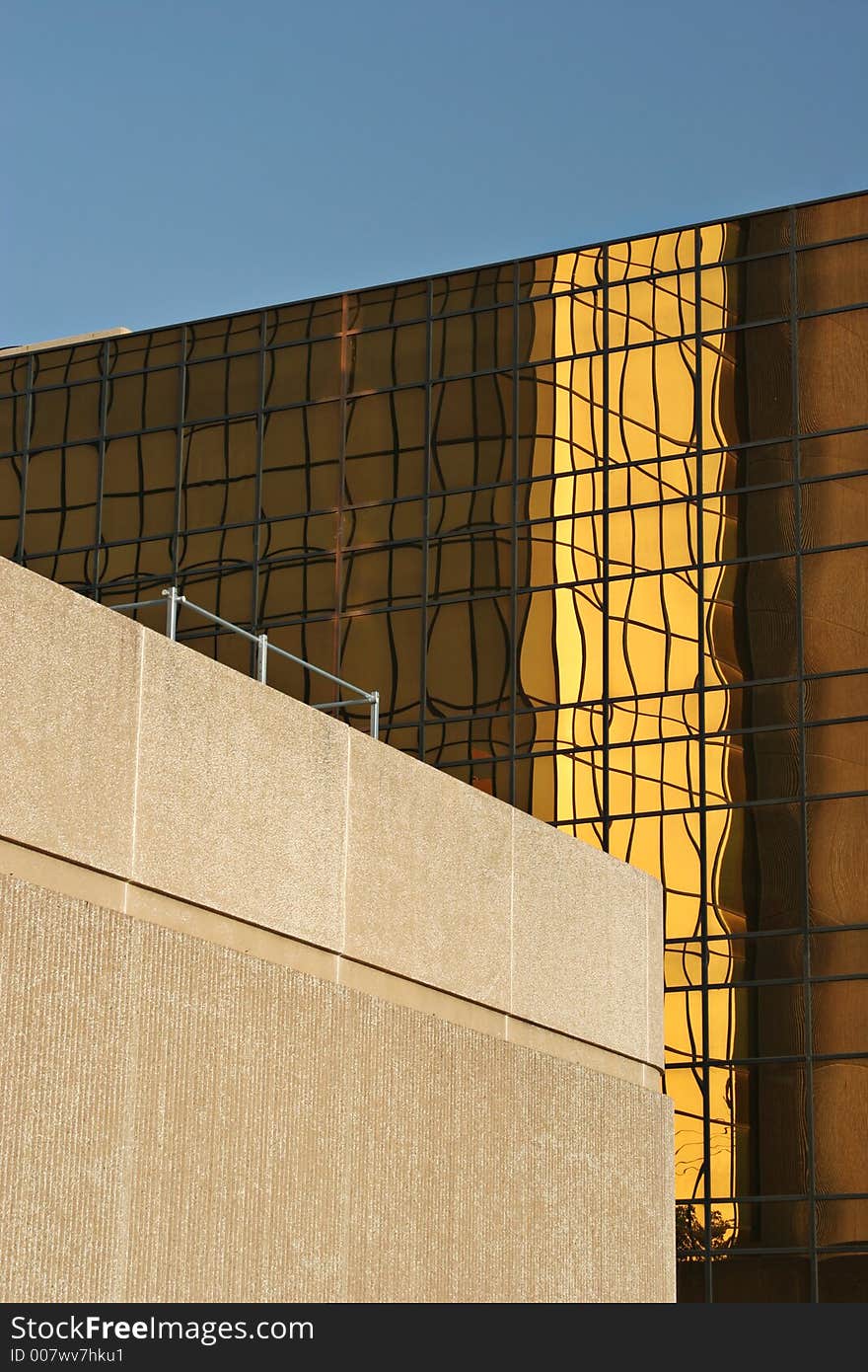 Office building in Texas with golden glass elevation