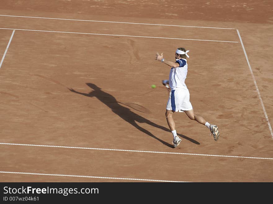 Tennis man in action on royal court. Tennis man in action on royal court