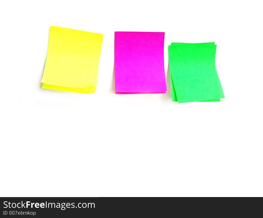 Several post it papers in differet colors. Several post it papers in differet colors