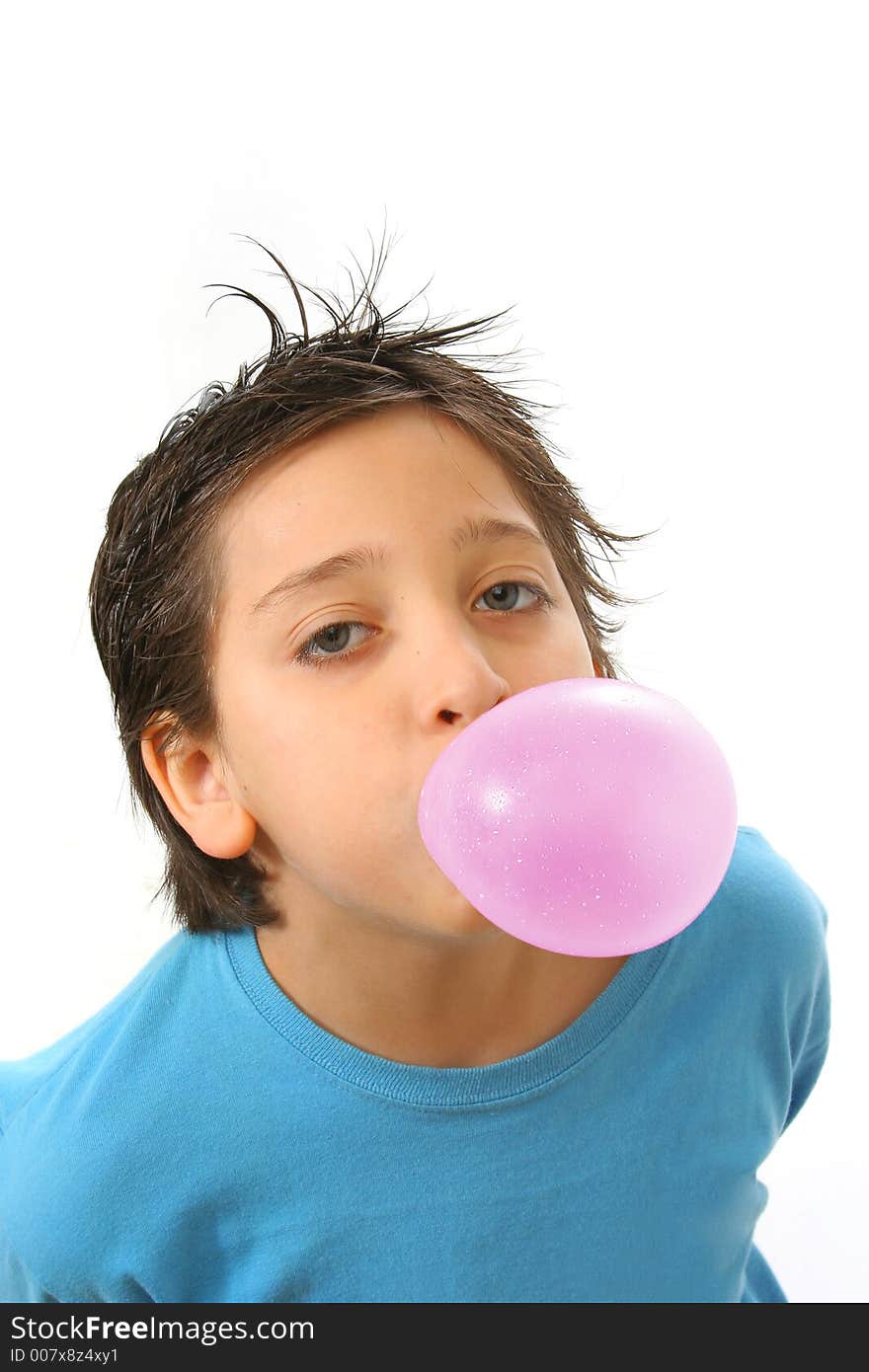 Boy Blowing A Pink Bubble Gum