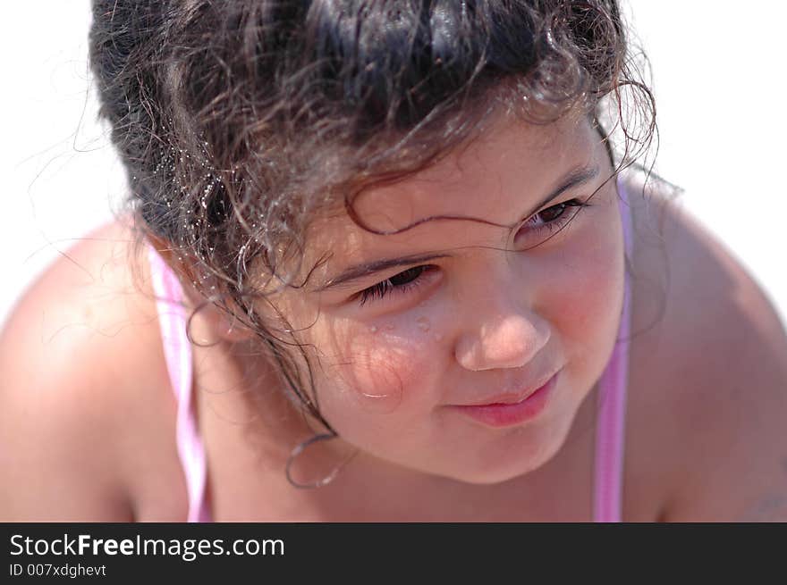 Child laying on beach and looking to the sea. Child laying on beach and looking to the sea