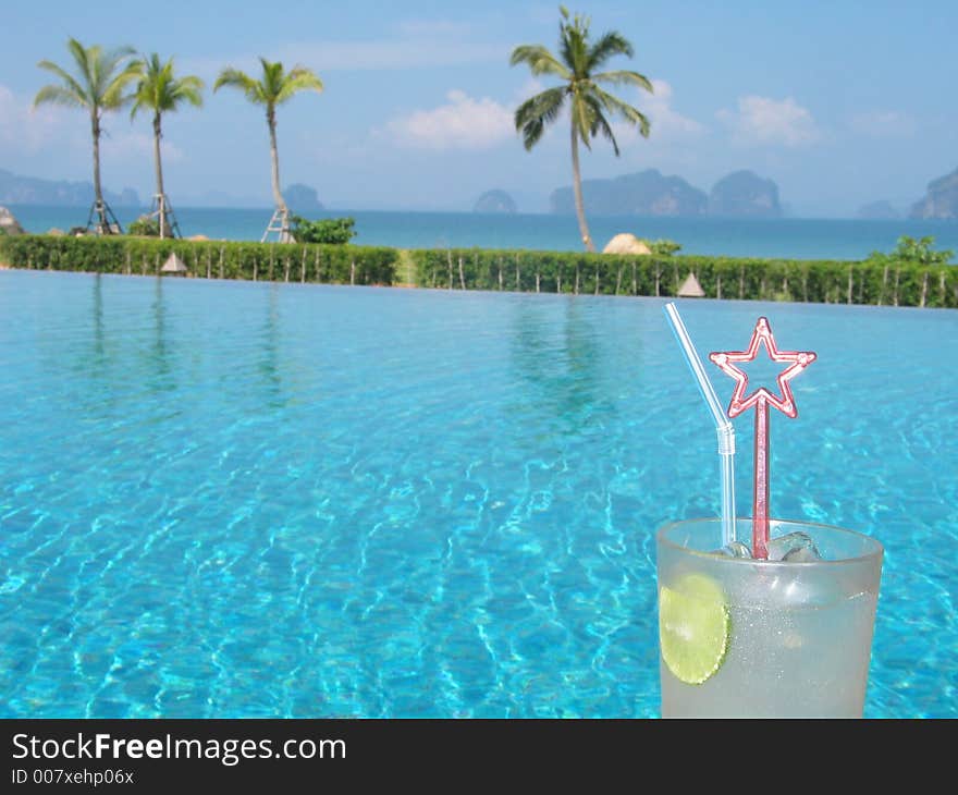 Refreshing drink at the poolside. Refreshing drink at the poolside...