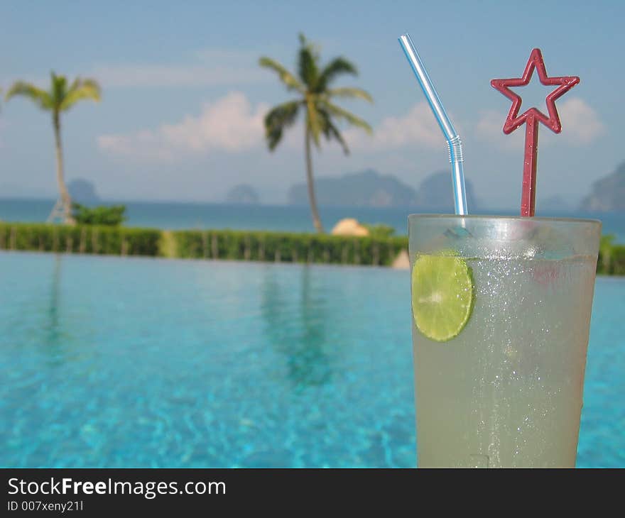 Refreshing drink at the poolside. Refreshing drink at the poolside...