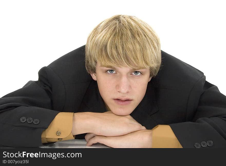 Attractive teen boy in business suit. Attractive teen boy in business suit.