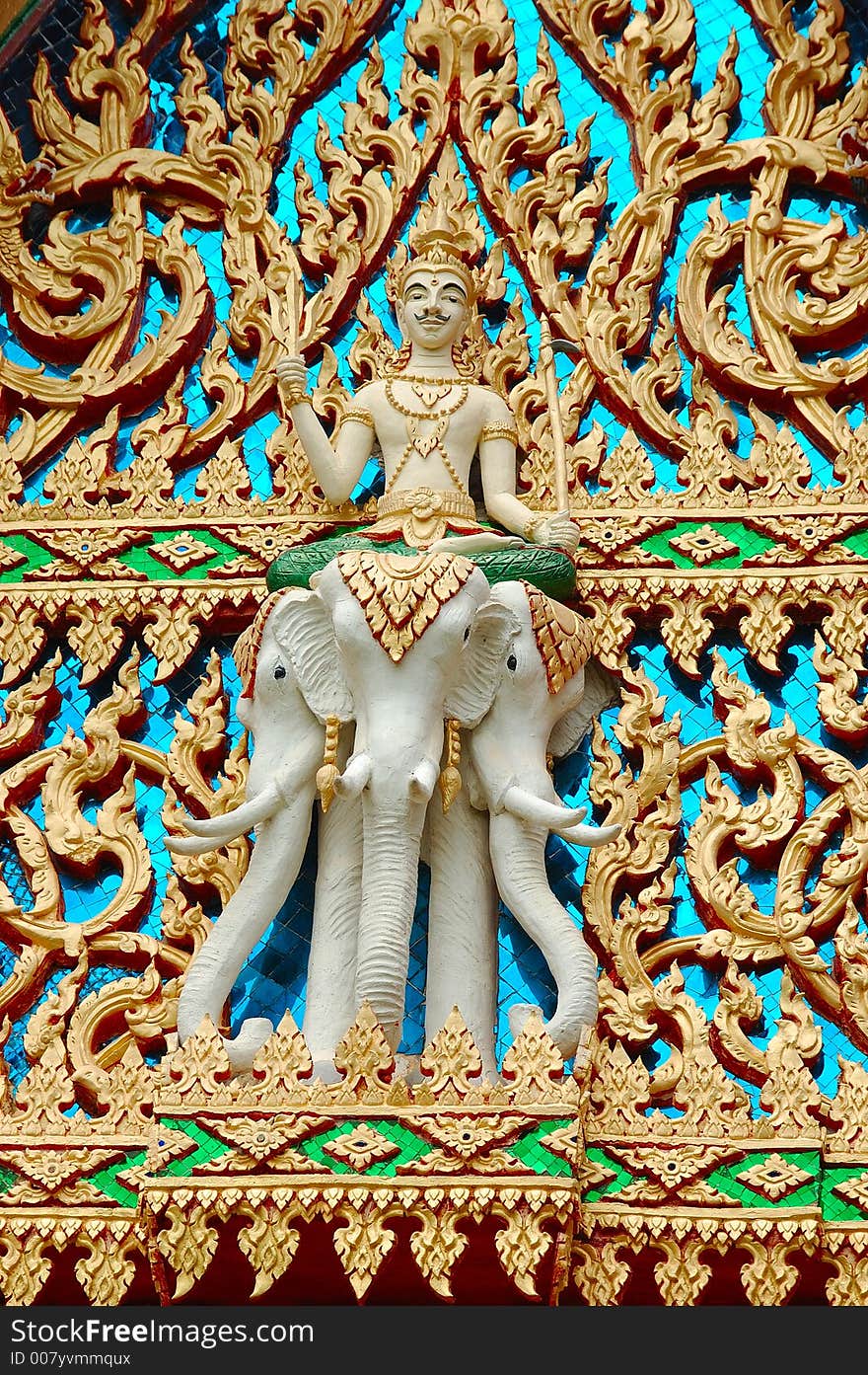 Buddhist temple details at wat in Surat thani.