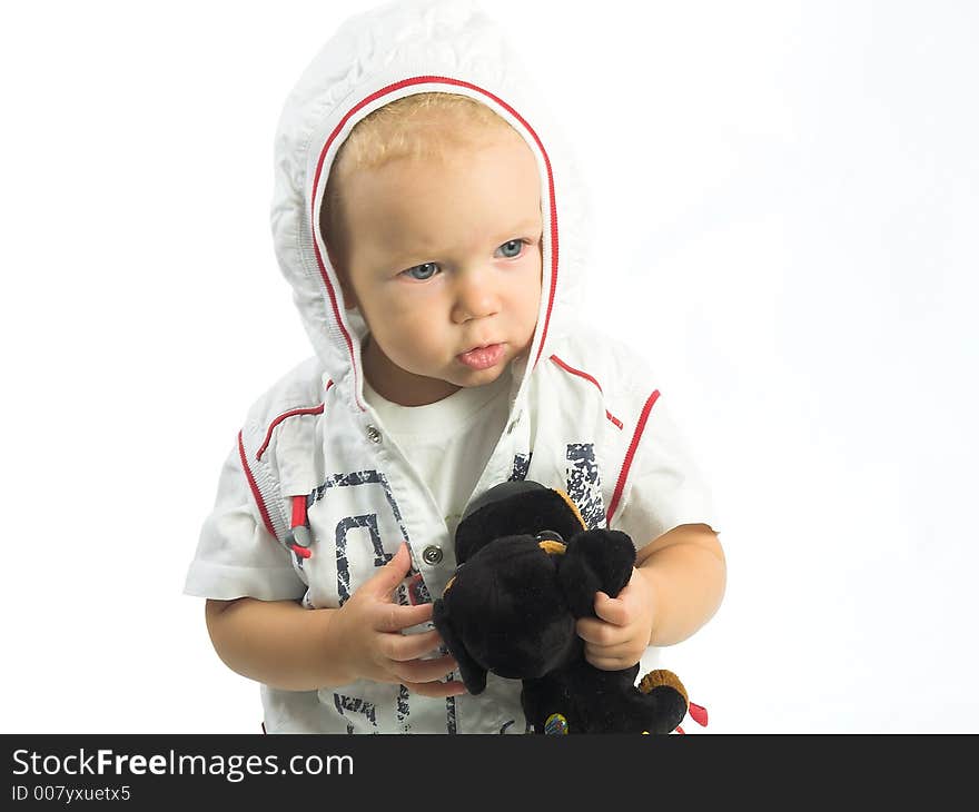 Little boy with toy. Studio shot. Little boy with toy. Studio shot.