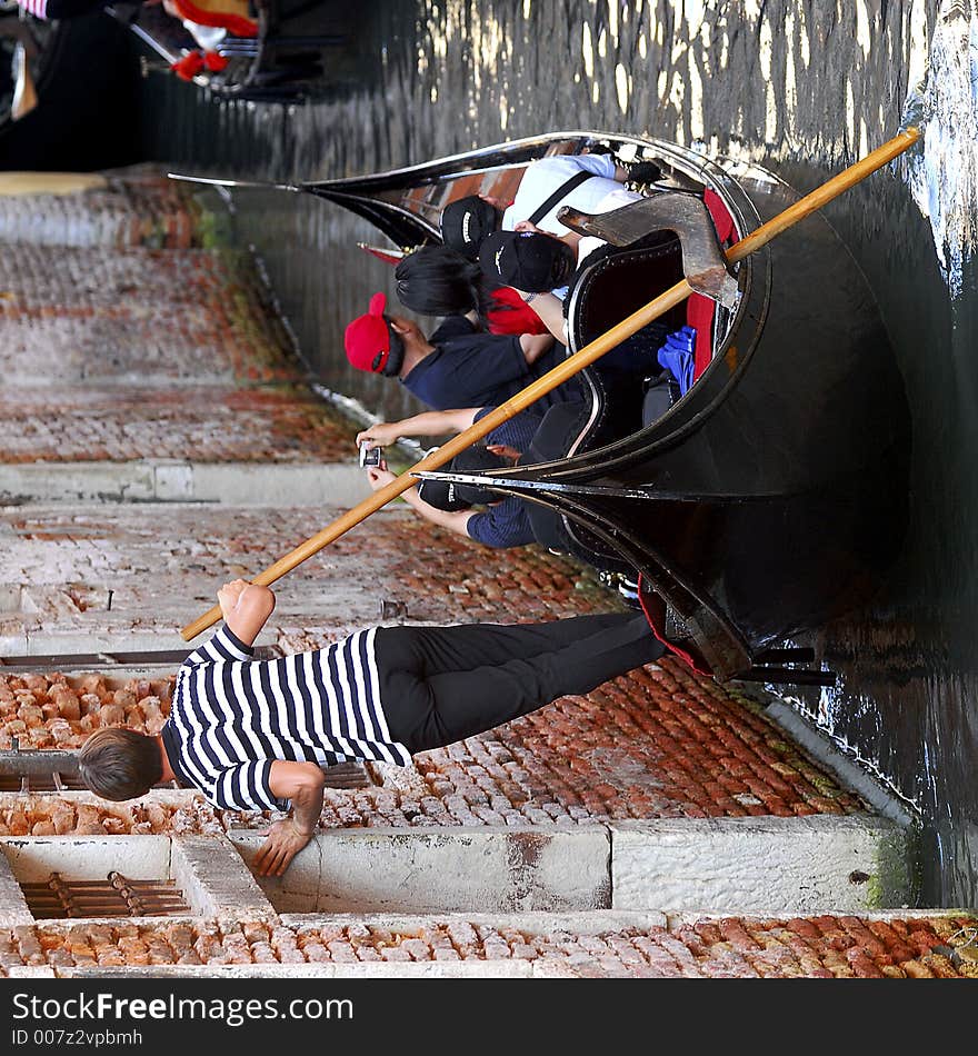 Part of the make-up of Venice are the Gondolas and the Gondaliers. You'll see them pushing off walls with their hands and feet. Part of the make-up of Venice are the Gondolas and the Gondaliers. You'll see them pushing off walls with their hands and feet.