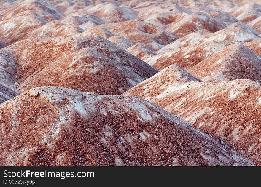 Heaps of sand on a construction base. Heaps of sand on a construction base