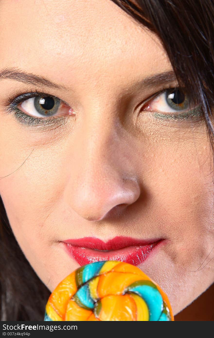 Woman with lollipop