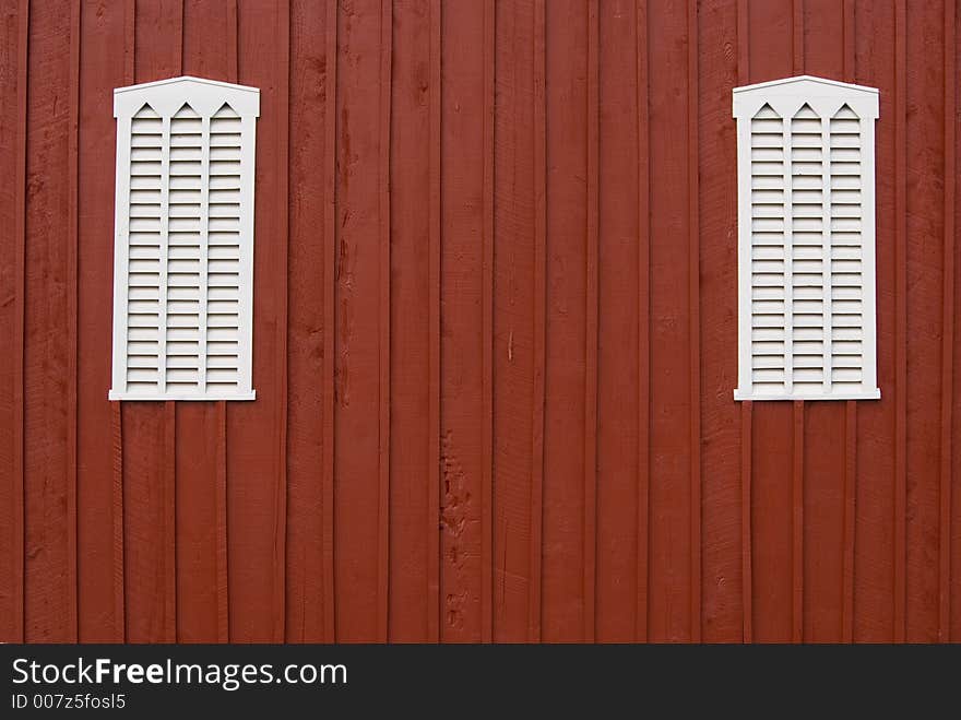 Louvered barn side with windows