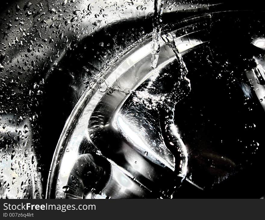 Splash of water on the metal surface