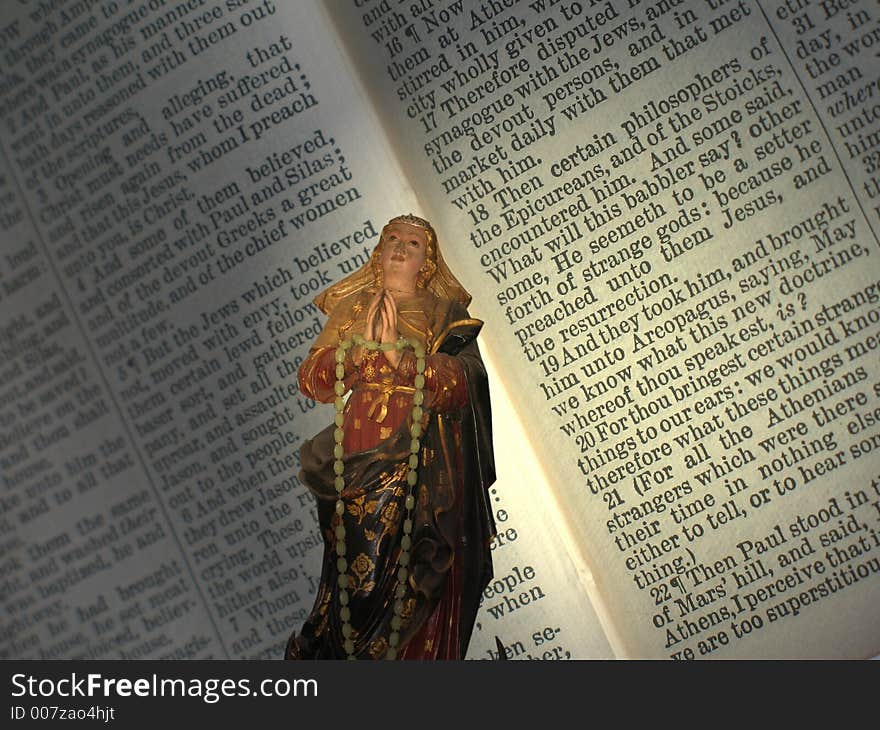 Mother In Front Of Holy Book.