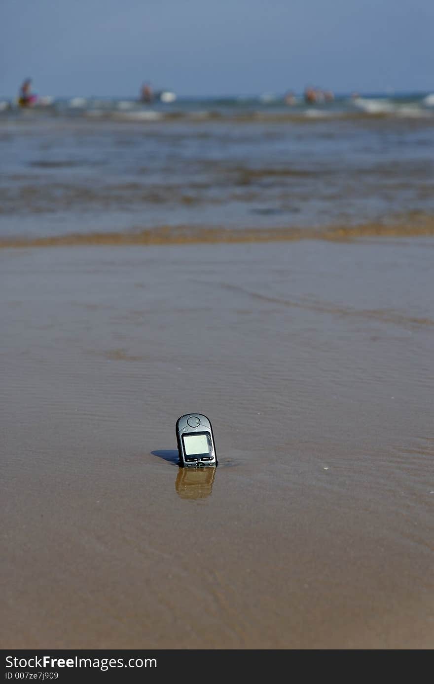 Mobile-phone left on the beach. Mobile-phone left on the beach