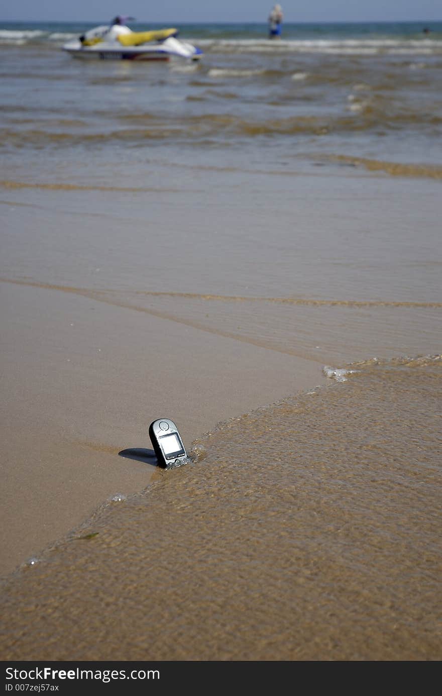 Mobile-phone left on the beach. Mobile-phone left on the beach