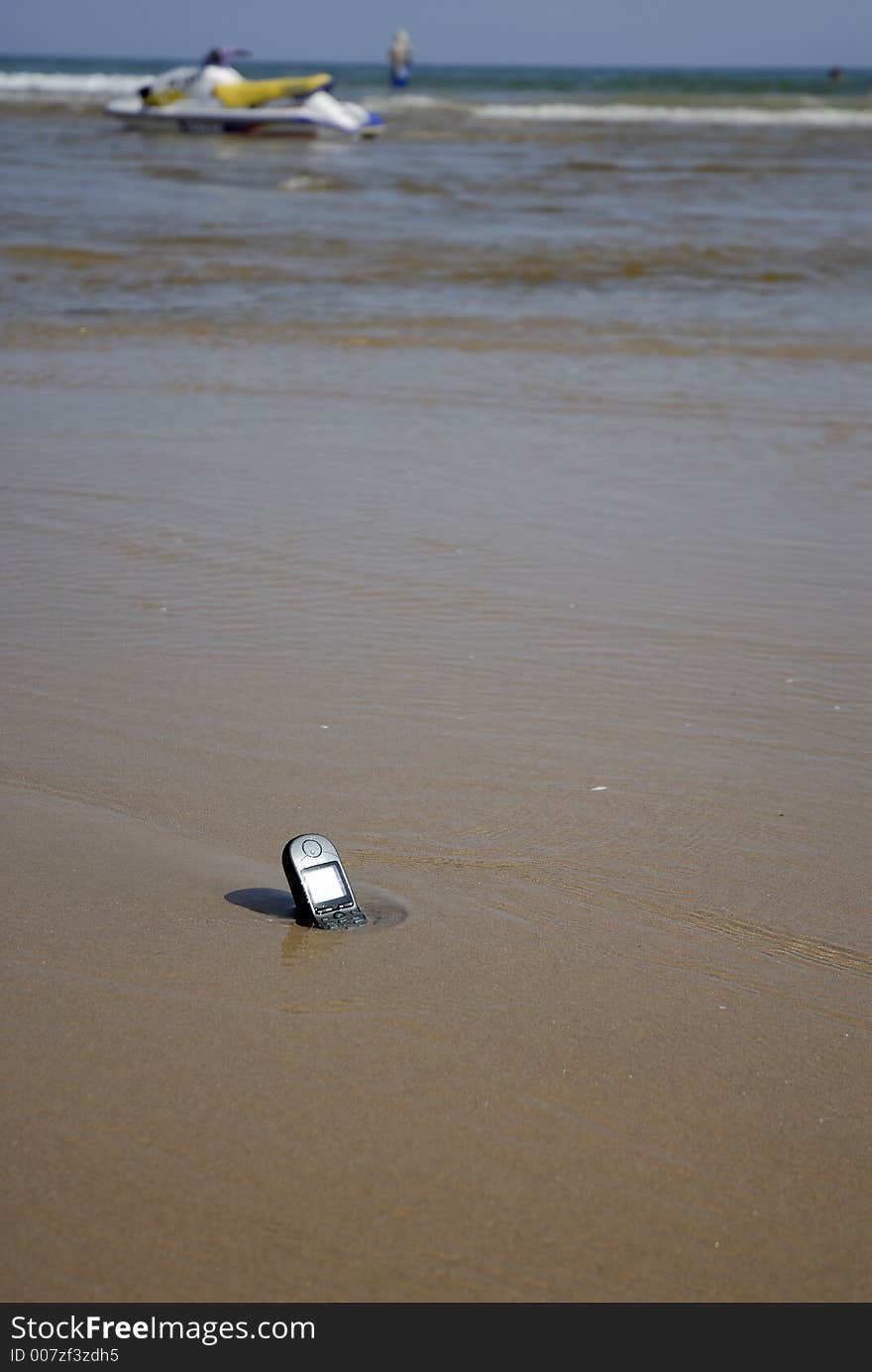 Mobile-phone left on the beach. Mobile-phone left on the beach