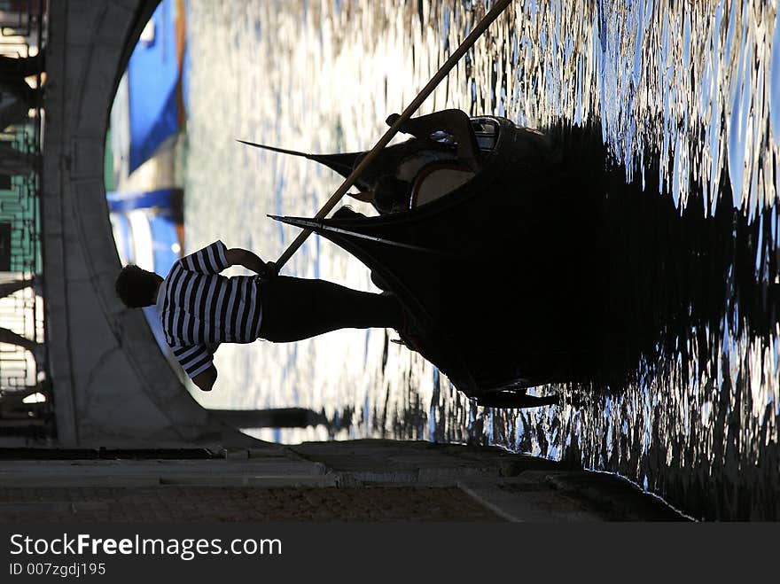 Part of the make-up of Venice are the Gondolas and the Gondaliers. With some canals being dark, they can make great silhouettes. Part of the make-up of Venice are the Gondolas and the Gondaliers. With some canals being dark, they can make great silhouettes.