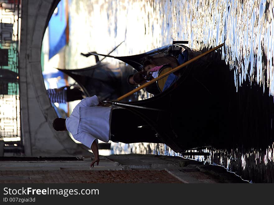 Part of the make-up of Venice are the Gondolas and the Gondaliers. With some canals being dark, they can make great silhouettes. Part of the make-up of Venice are the Gondolas and the Gondaliers. With some canals being dark, they can make great silhouettes.