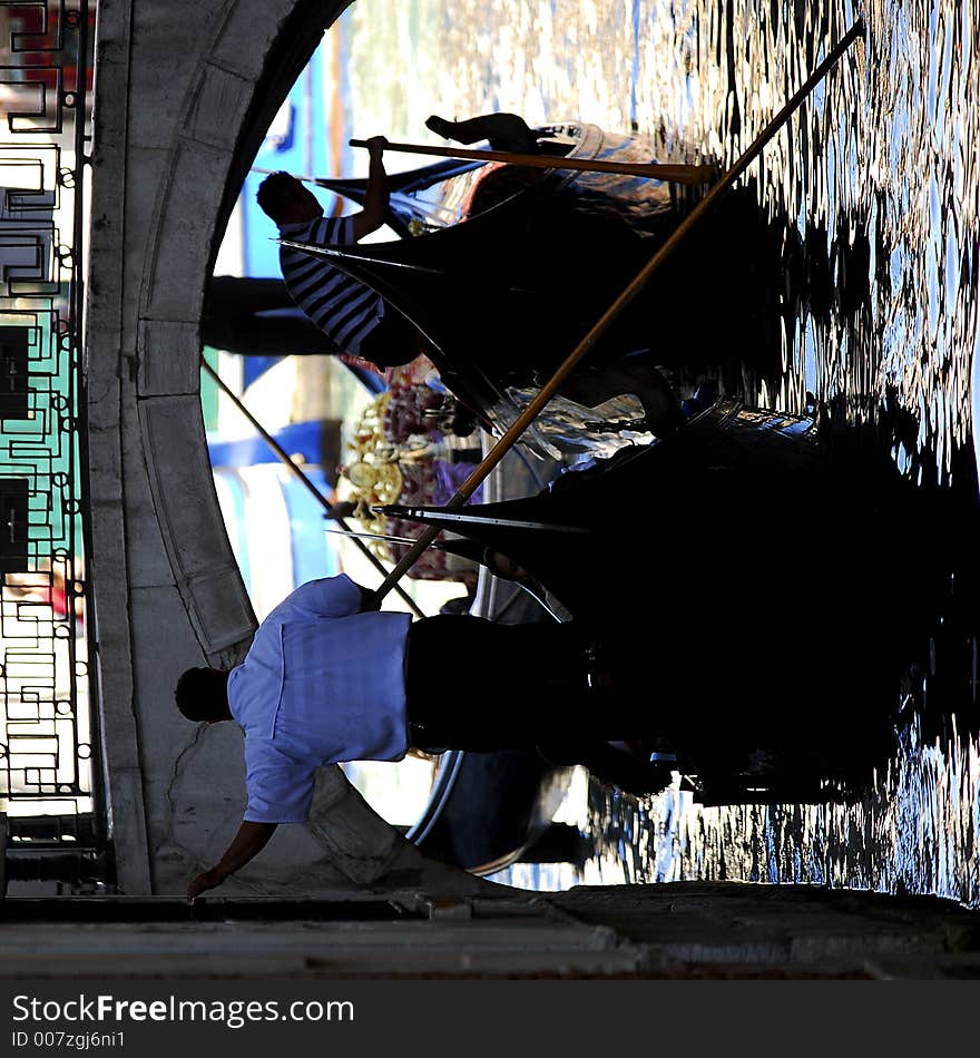 Part of the make-up of Venice are the Gondolas and the Gondaliers. With some canals being dark, they can make great silhouettes. Part of the make-up of Venice are the Gondolas and the Gondaliers. With some canals being dark, they can make great silhouettes.