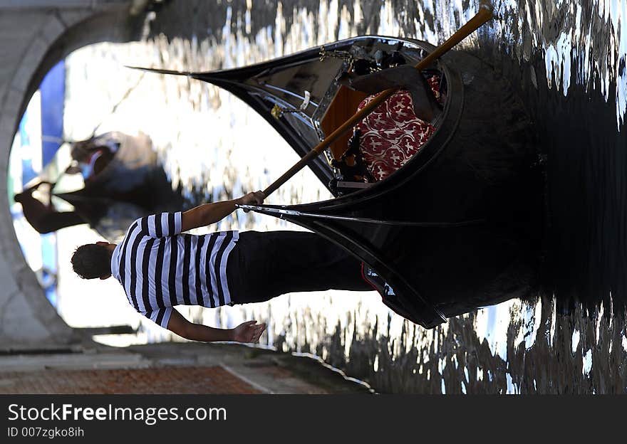 Part of the make-up of Venice are the Gondolas and the Gondaliers. With some canals being dark, they can make great silhouettes. Part of the make-up of Venice are the Gondolas and the Gondaliers. With some canals being dark, they can make great silhouettes.