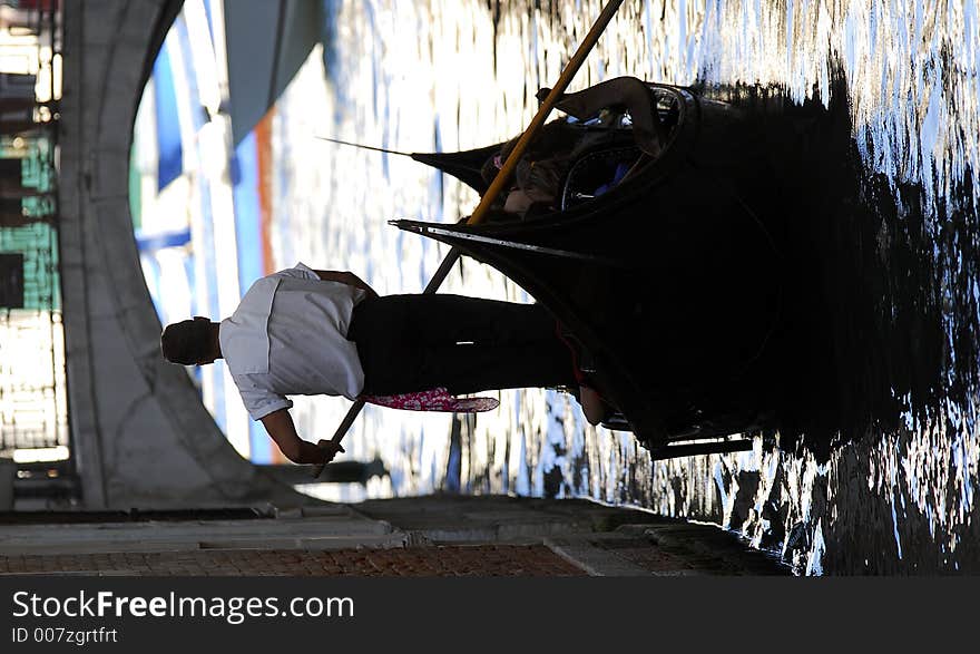 Part of the make-up of Venice are the Gondolas and the Gondaliers. With some canals being dark, they can make great silhouettes. Part of the make-up of Venice are the Gondolas and the Gondaliers. With some canals being dark, they can make great silhouettes.