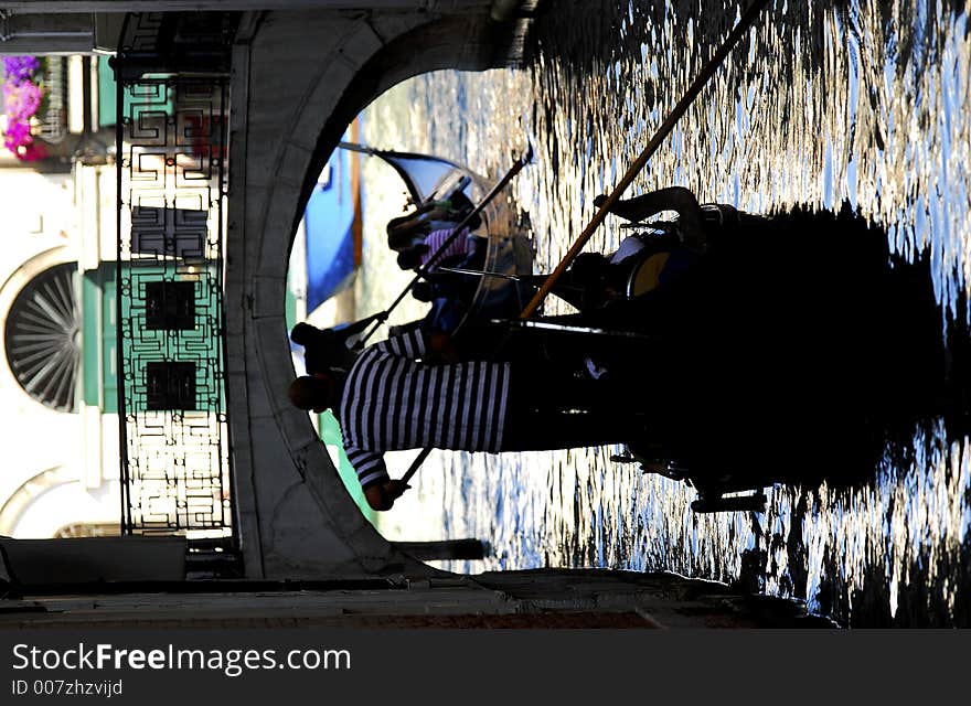 Part of the make-up of Venice are the Gondolas and the Gondaliers. With some canals being dark, they can make great silhouettes. Part of the make-up of Venice are the Gondolas and the Gondaliers. With some canals being dark, they can make great silhouettes.