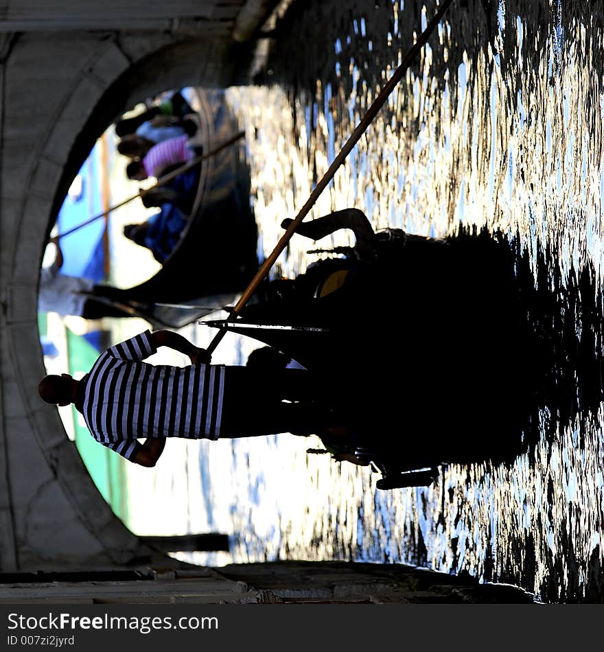 Part of the make-up of Venice are the Gondolas and the Gondaliers. With some canals being dark, they can make great silhouettes. Part of the make-up of Venice are the Gondolas and the Gondaliers. With some canals being dark, they can make great silhouettes.