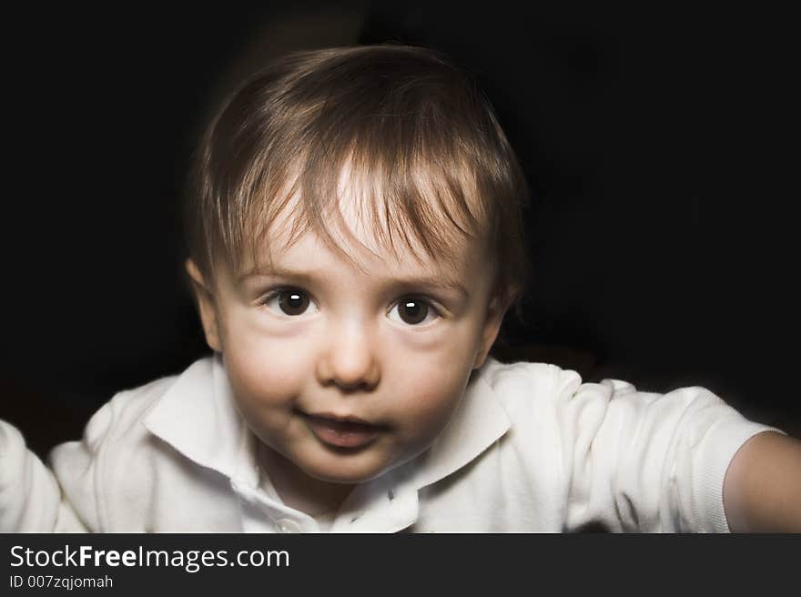 Baby portrait over black background