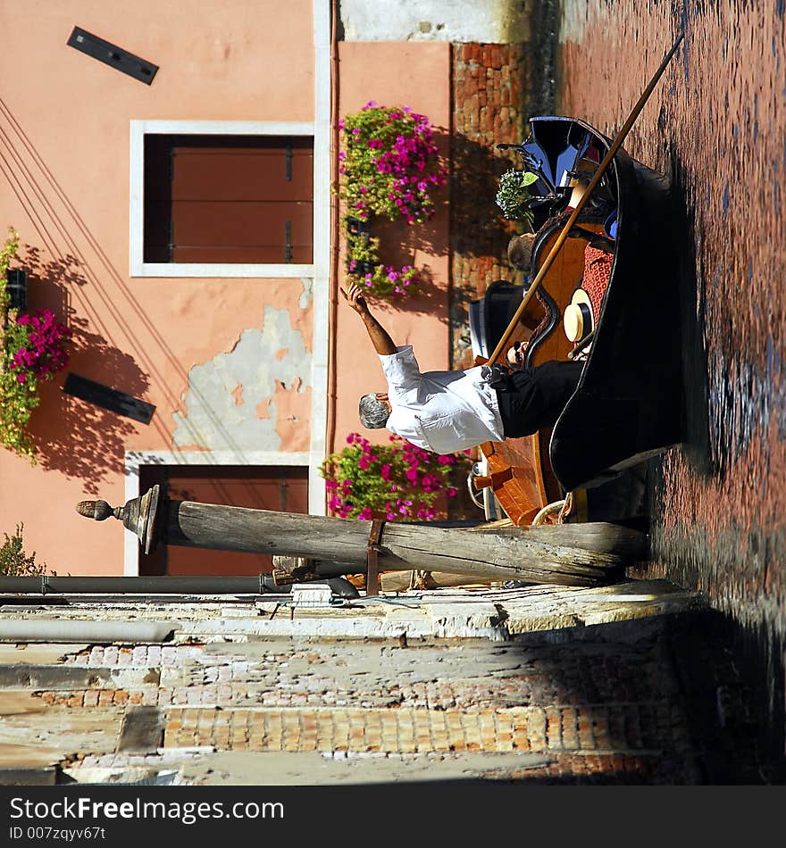 Part of the make-up of Venice are the Gondolas and the Gondaliers. The Gondalier is pointing out something of interest. Part of the make-up of Venice are the Gondolas and the Gondaliers. The Gondalier is pointing out something of interest.