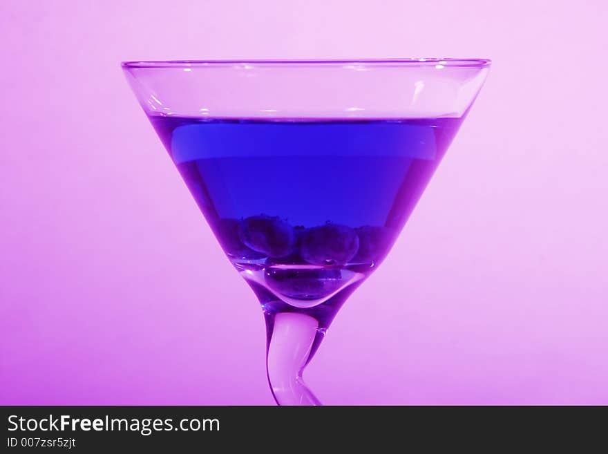 Blueberry Martini with blueberry dropped in