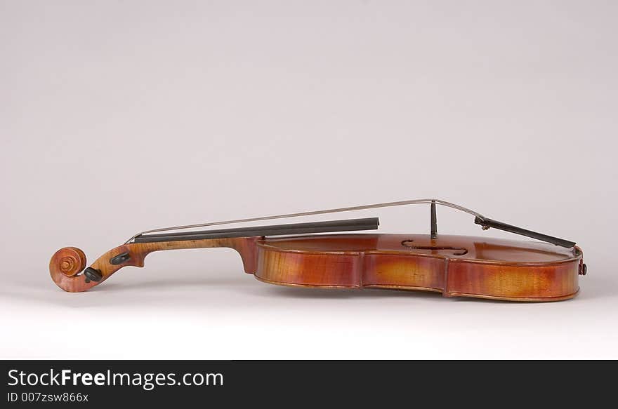 Isolated Antique Violin On Its  Back_8194-1S