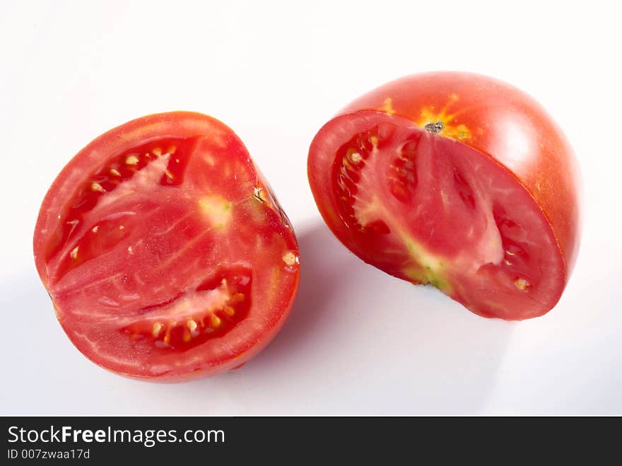 Cutted tomato over white background. Cutted tomato over white background