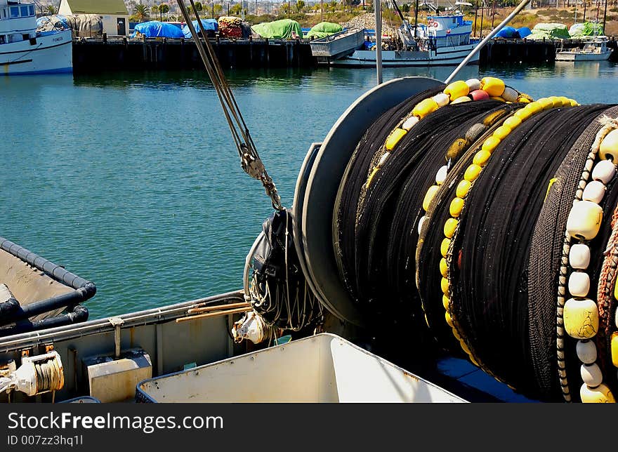 A fish net and ships