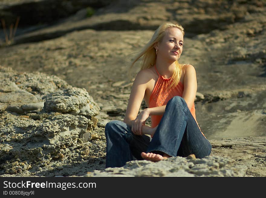 The young beautiful girl on the nature. The young beautiful girl on the nature