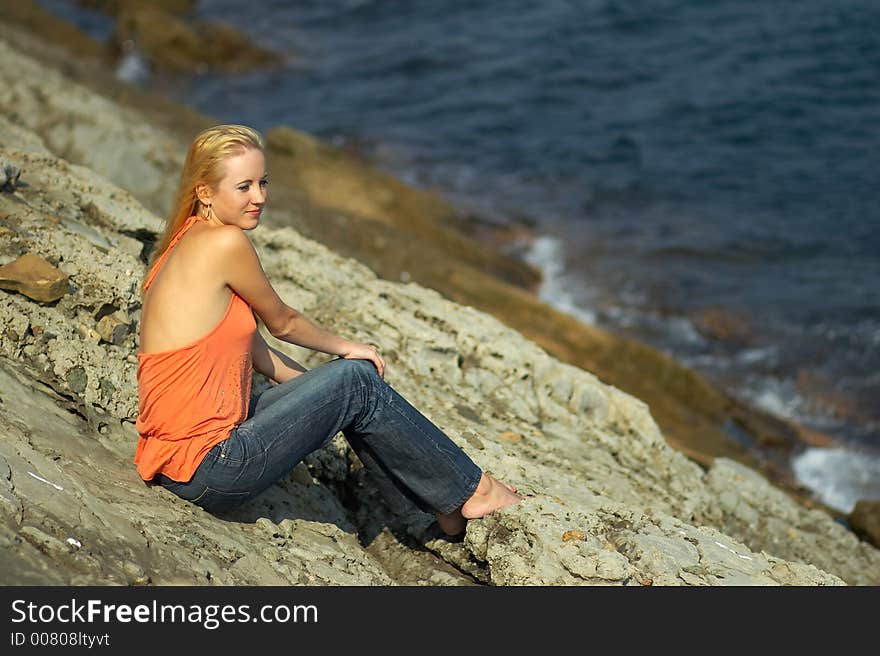 The young beautiful girl on the nature. The young beautiful girl on the nature