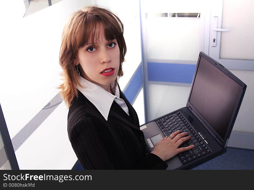 Portrait of a businesswoman when working. Shot in studio. Portrait of a businesswoman when working. Shot in studio.