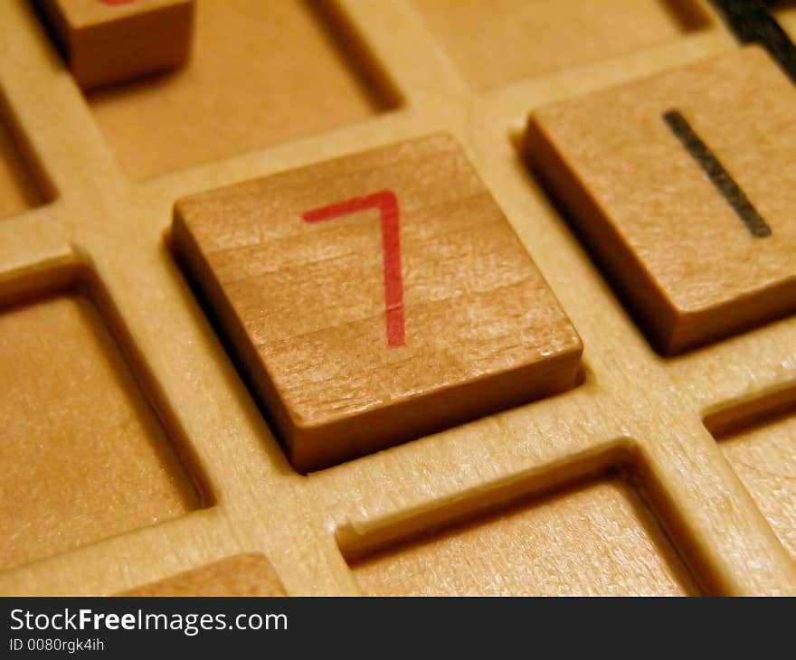 Wood sudoku board and tiles.