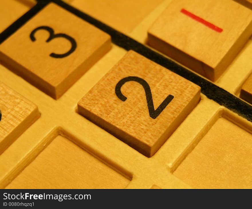 Wood sudoku board and tiles.